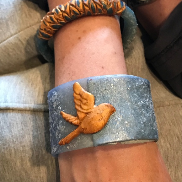 Matana chasing a feather Bird bangle in Denim - Picture 5 of 8